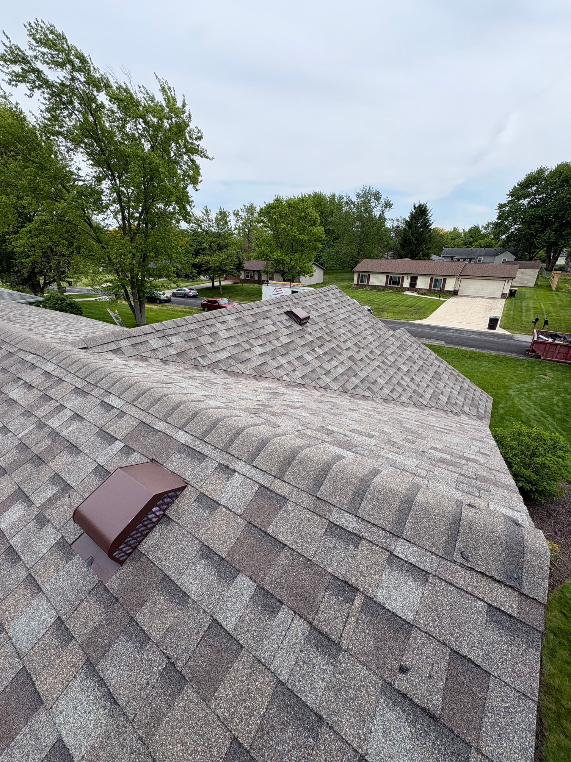 Gallery photos for Owens Corning Driftwood Shingles and Pebblestone Clay Gutters Done Right: Image #1