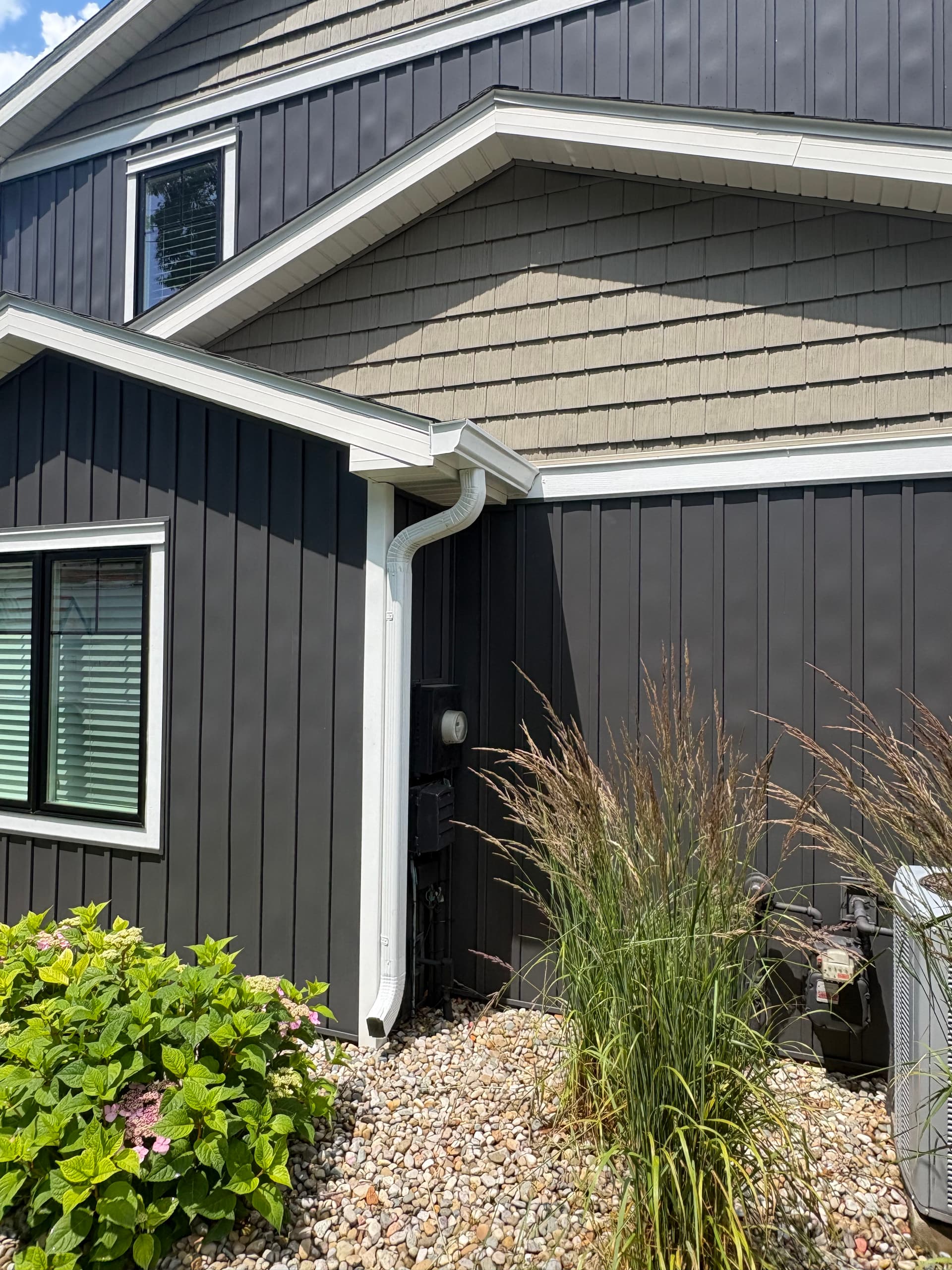 Gallery photos for Dark Board and Batten Siding and Gutter Install on a Lakefront Home: Image #5