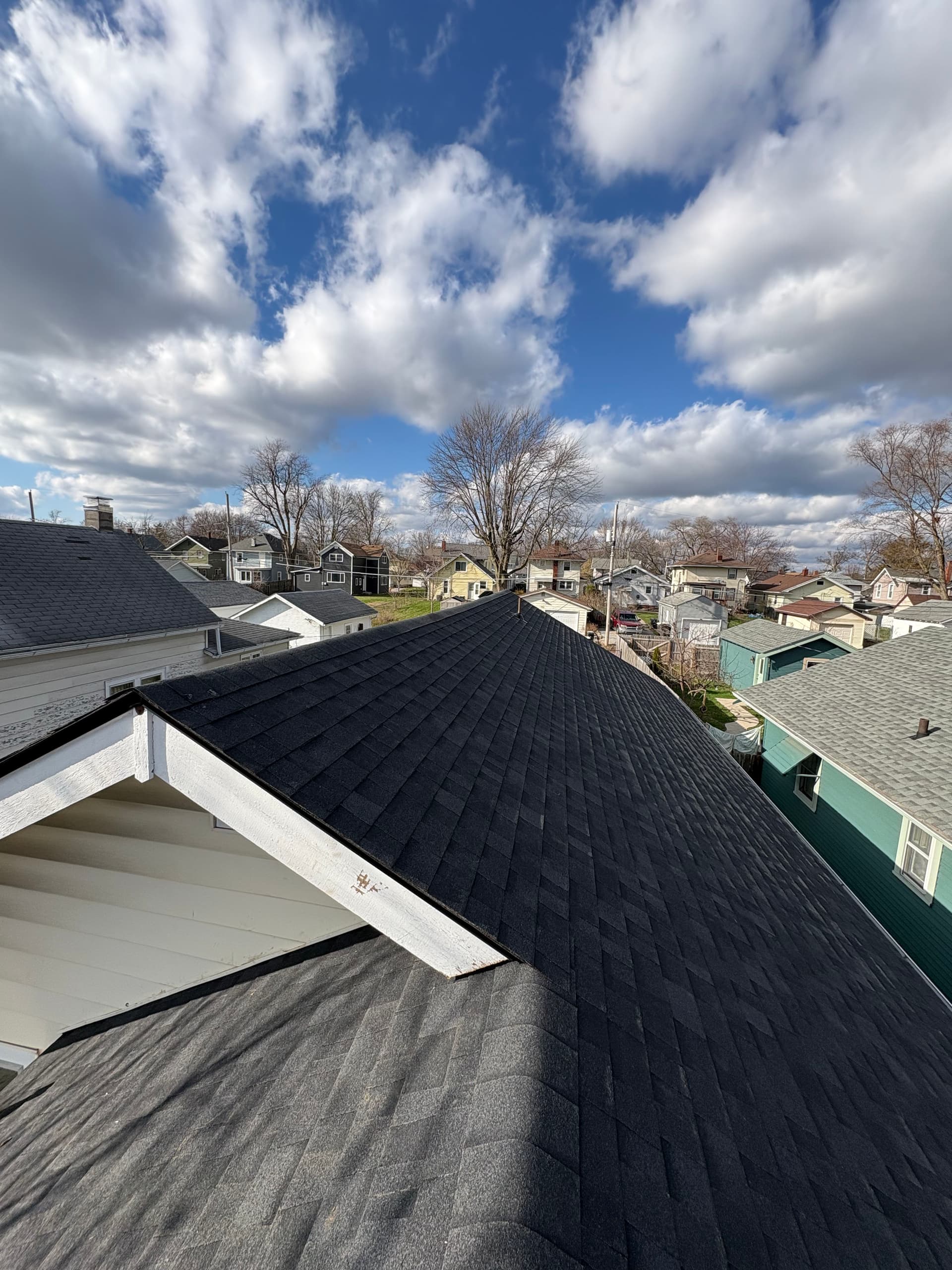 Fresh Asphalt Shingle Roof Installation on a Residential Home image